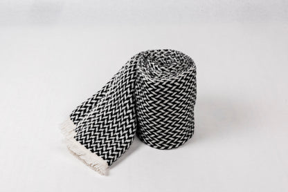 Cashmere Herringbone Narrow Shawl in black and white, soft and lightweight, perfect for elevating style.