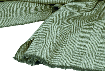Cashmere Herringbone Scarf Light in vibrant green, showcasing soft and luxurious texture perfect for any outfit.