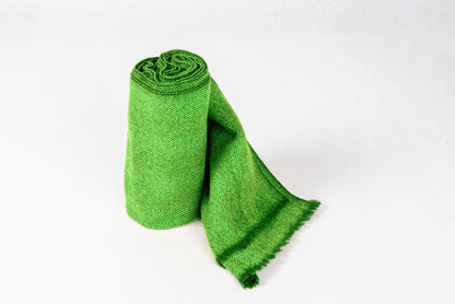Cashmere Herringbone Scarf Light in vibrant green, showcasing soft and luxurious texture perfect for any outfit.