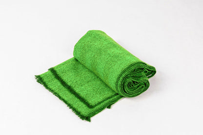 Cashmere Herringbone Scarf Light in vibrant green, showcasing soft and luxurious texture perfect for any outfit.